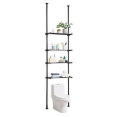 a bathroom shelving unit with three shelves and a toilet