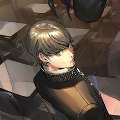 an anime character sitting at a table in front of a spider on the wall behind him