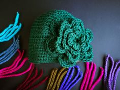 "Chunky knitted hat with giant flower for girls or women. A great option if you are looking for \"Mommy and me matching look\". This hat with a big flower is handmade from very soft and warm wool acrylic blend yarn. Perfect winter or fall accessory where to hide from cold weather. You're sure to get so many compliments on this one. Be visible, be magnificent, let others look back at you! SIZE Sizing chart / head circumference * 0 - 3 month - 42 - 44 cm... 16 1/2 - 17 1/3 in'' * 3 - 6 month - 44 Handmade Fitted Bohemian Crochet Hat, Cute Handmade Green Crochet Hat, Handmade Fitted Crochet Hat Cute Style, Handmade Fitted Crochet Hat In Cute Style, Handmade Fitted Cute Crochet Hat, Handmade Adjustable Crochet Hat With Flower Shape, Handmade Fitted Green Crochet Hat, Handmade Adjustable Crochet Flower Hat, Green Handmade Fitted Crochet Hat