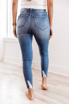 These trendy distressed hem jeans are such a must-have style for any season! We love the timeless medium wash denim color paired with a stylish button detail. It's so easy to wear this with a variety of vibrant blouses, layering tanks, and classic neutral cardigans! 60% cotton, 21% modal, 13.8% polyester, 3.2% rayon, 2% spandex Machine wash cold inside out / Tumble dry low Materials may have natural variations Colors may vary from different viewing devices. Distressed Hem Jeans, Beige Hat, Chic Sunglasses, Wide Brim Fedora, Layering Tanks, Denim Color, Hem Jeans, Color Pairing, Medium Wash Jeans