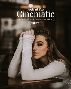 a woman sitting at a table with her hands on her head and the words portrait pro cinematic