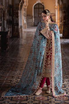 Mohsin Naveed Ranjha Bibi Lal Zarlish Wedding Festive Collection Original brand suit fabric and photography lite diffrance in actual print. Red Silk Shirt, Mohsin Naveed Ranjha, Blue Organza, Embellished Shirt, Bridal Elegance, Pakistani Wedding Dresses, Precious Jewels, Organza Dupatta, Suit Fabric