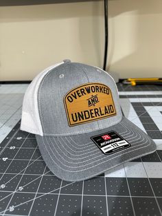 Custom laser engraved patch hats! Put YOUR custom logo on a hat, no minimum. I use hats such as Richardson 112, Yupoong Flexfit, Yupoong 6606, 47 Brand Clean Up and more.  Just send me a message with your logo, then: - Choose your hat style/color - Choose your patch color Turn around time is 1-2 days after all details are finalized! Patch Hats, Hat Patches, Hat Style, 47 Brand, Custom Leather, Leather Patches, Custom Logo, Trucker Cap, Full Grain Leather