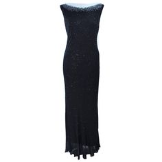 This Jovani gown is composed of a bias cut beaded fabric and features a white contrast neck. Features a v back. Pull over style. In excellent vintage condition. **Please cross-reference measurements for personal accuracy. Size in description box is an estimation. Measures (Approximately) Length: 61" Bust: 40" Waist: 29" - 36" Hip: 38" -42" Black And White Evening Dresses, Jovani Gown, Beaded Fabric, Gown White, White Evening Dress, White Gowns, Beaded Gown, Black N White Dress, Mother Of The Bride Dresses