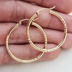 Elegant Real 14k Yellow Gold Half Diamond Cut Hoop Earrings. Ideal To Wear Every Day, Everywhere. Unique, Modern, And Everlasting. 14k Gold Will Not Tarnish Or Rust. Perfect Gift For Her. Materials: 14k Yellow Gold Lenght: 30mm Thickness: 2mm Weight: 2 Grams 14k Stampes Brand New For Her Fast Shipping Follow Us For More Fine 14k Gold Jewelry For Fair Prices Dm Me With All Your Questions. I Will Be Happy To Help! Gold Hoop Earrings Bali, Bali Hoop Earrings Gold, Gold Hoop Earrings Style, Gold Bali, Hop Earrings, Gold Jewelry Collection, Creative Jewelry Photography, Bali Earrings, Jewelry Accessories Ideas