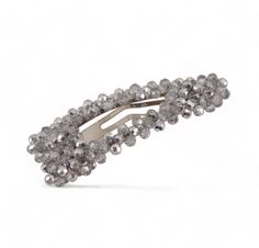 Everyone needs a "Star Galaxy" crystal designer girls barrette clip, as it is a must have trend! This handcrafted barrette has been embellished with metallic silver cut crystals to create a truly sparkling hair accessory. A perfect style for everyday and all other special occasions. Metallic Silver