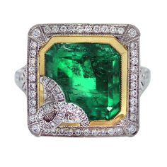 Emerald, Platinum, Yellow Gold, Diamond Cocktail Ring This estate, vintage Emerald gemstone, and natural diamond ring makes a huge statement. This ring is fun for a night out and will be an excellent addition for any holiday party looks. Gemstones are popular around the holidays because of their vibrant colors but can be worn year-round. Style: Emerald, Platinum, Yellow Gold, Diamond Cocktail Ring Main Stone: Square Emerald, measuring approximately 12mm x 11mm Stone Carat Weight: 8.65 carats Sto Vintage Cocktail Ring, Yellow Gold Diamond Ring, Gold Cocktail Ring, Yellow Gold Jewelry, Diamond Cocktail Rings, Gold Diamond Ring, 18k Gold Ring, Emerald Jewelry, Fine Rings