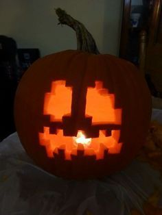 a pumpkin carved to look like it has been carved into the shape of a face