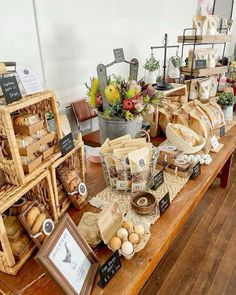 the table is covered with bread and other items