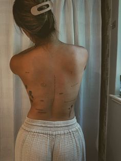 a woman with her back turned to the camera