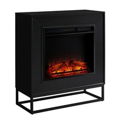 an electric fireplace with flames on the side and black frame, in front of a white background