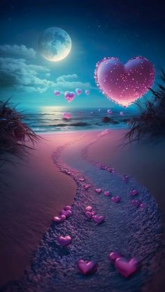 hearts floating in the air on a beach at night with moon and stars above it