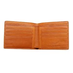 GENUINE CROCODILE STOMACH SKIN LEATHER WALLET GOLDEN TAN  made of genuine crocodile leather;  interior made of cowhide;  constructed by hand;  features a bi-fold design;  size when closed 4 ½” x 3 6/8” (108 mm x 95 mm);  provides 2 compartments for cash as well as 10 credit card slots.   Want to make a statement every time you yank your wallet out of the pocket? Then you can’t do without a sleek bi-fold made of genuine exotic leather such as this Light Brown Crocodile Mens Wallet. Not only is it Luxury Men's Crocodile Pattern Wallet, Business Bifold Wallets With Crocodile Pattern, Luxury Cognac Bifold Wallet, Leather Bifold Wallet With Crocodile Pattern, Classic Leather Wallet With Crocodile Pattern, Formal Leather Wallets With Crocodile Pattern, Formal Crocodile Pattern Leather Wallets, Golden Tan, Wallet For Men