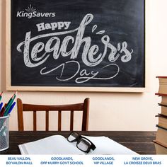 a blackboard with the words happy teacher's day written on it next to a stack of books