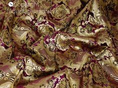 Purple Indian Brocade Fabric By The Yard Banarasi Wedding Bridal Dresses Material Lehenga Costume Sewing Crafting Home Decor Table Runners. This is a beautiful heavy benarse art silk brocade floral design fabric in Purple and Gold. ➤Product: Brocade Fabric ➤Fabric Type: Blended Silk (Viscose and Silk) Fine quality Zari Brocade Weaving from Banaras ➤Color: Purple and Gold ➤Width: 44 inches. ➤Condition: New ➤Code: bg2158 ➤Listing for 1 Yard of fabric. ➤Care: Dry Clean Only You can use this fabric Elegant Wedding Fabric With Motifs, Brocade Embroidered Fabric With Zari Work For Wedding, Traditional Wedding Fabric With Intricate Embroidery, Wedding Brocade Fabric With Zari Work, Art Silk Fabric With Traditional Patterns For Wedding, Bollywood Style Embroidered Fabric With Pallu For Ceremony, Wedding Art Silk Fabric With Traditional Patterns, Gold Lehenga With Pallu For Ceremony, Bollywood Zari Weaving Fabric For Wedding