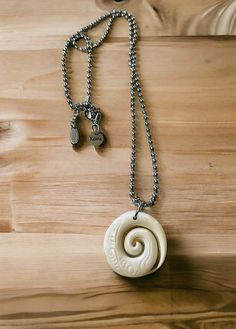 Maori bone koru pendant with stainless steel koru pendant with chain necklace.  Color is slightly different due to lightening. Please message me for any questions. Mahalo! Pendant With Chain, Steel Necklace, Stainless Steel Necklace, Pendant Necklaces, Necklace Etsy, Jewelry Necklace Pendant, Bones, Chain Necklace, Jewelry Necklaces