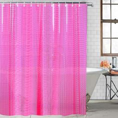 a pink shower curtain in a bathroom