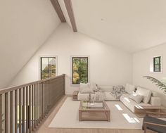 a living room filled with white furniture and lots of windows