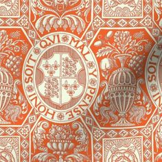 an orange and white wallpaper with crests on it's sides, in the middle