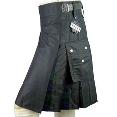 Elevate your style and embrace your Scottish heritage with the exceptional Highland Kilt Company Black Watch Cargo Combo Kilt, a perfect blend of tradition and contemporary fashion. Crafted with meticulous attention to detail, our kilts are made from premium-quality materials to ensure unrivaled comfort and durability. Crafted from heavy cotton with tartan inserts in the pleats, it exudes a luxurious feel and boasts excellent appeal, making it suitable for various events and occasions. The kilt' Classic Black Watch With Black Band, Utility Kilt, Scottish Heritage, Kilt, Black Watch, Contemporary Fashion, Showcase Design, Polished Look, Favorite Jeans