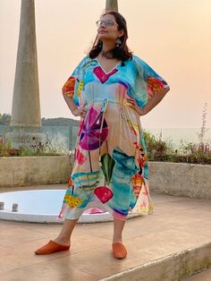 This is our "Timeless" style kaftan. It features a drawstring that you can cinch at the waist. This loose fitting Caftan House dress is exceptionally comfortable and stylish.I created a short video about this stylehttps://youtu.be/GDo-9c5XItkAs for the fabric pattern, we have used a hand drawn and digitally painted technique. So they are all unique designs. It is like wearing wearable art. What I love about digital paintings is that they look as beautiful as the hand paintings but the care neede Patterned Bridesmaid, Mauve Bridesmaid, Kaftan Styles, Hand Paintings, Bridesmaid Pjs, Bridesmaid Pyjamas, Digital Paintings, House Dress, Fabric Pattern