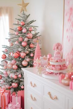 25+ Pink Christmas Decor Ideas for a Cozy Holiday Home Pink Christmas Party Backdrop, Pink Christmas Display, Girly Christmas Room Decor, Red White And Pink Christmas, Pink Christmas Kitchen, Pink Christmas Room Decor, Pastel Candy Christmas, Pink And Red Christmas Tree, Pink Christmas Party