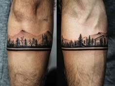 two men's legs with trees and mountains tattoo on their thighs, one is black and white