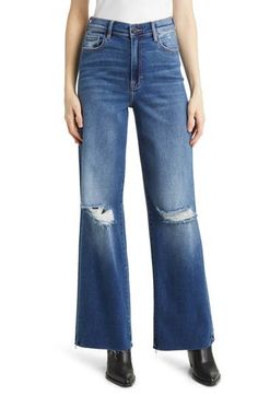 A modern take on classic '90s jeans, this roomy pair adds drama to your look with ripped knees, raw hems and stretch-kissed denim. Zip fly with button closure Five-pocket style 93% cotton, 5% polyester, 2% spandex Machine wash, tumble dry Imported Edgy High Rise Flare Jeans In Medium Wash, Edgy High Rise Medium Wash Flare Jeans, Edgy Denim Flare Jeans With Frayed Hem, Edgy Mid-rise Flare Jeans With Frayed Hem, Edgy Wide Leg Jeans With Frayed Hem, Edgy High Rise Relaxed Fit Jeans, Edgy High-rise Relaxed Fit Jeans, Edgy Relaxed Fit Cutoff Jeans, Edgy High Rise Relaxed Fit Flare Jeans