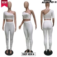 two mannequins with white clothing on display in front and back views, one is