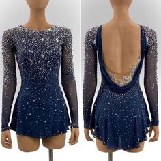 the back of a blue dress with sequins on it and an open neckline