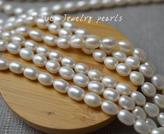 Pearl Item No : LY4054 Pearl Material : Freshwater Pearl Pearl Shape : Rice pearl Pearl Grade : AA Pearl Luster : High Pearl Body : Please look at picture Pearl skin: Clean Pearl Size : 6.7-7.5mm X 9-9.5mm (Approx) Pearl Quantity / Length : 42pcs(Approx) - 1 strand / 39cm=15.3 inches Pearl Color : White Condition : New and Good The order will be mailed out from Shanghai within 1-3 business days after getting payment, as I need time to finish your products by hand. Contact us : If you have any qu Pearl White Oval Beads Pearl Necklace For Gift, Pearl White Pearl Necklace With Oval Beads For Gift, Pearl White Necklace With Oval Beads For Gift, White Oval Beads Pearl Necklace Gift, White Oval Beads Pearl Necklace As Gift, White Oval Beads Pearl Necklace For Gift, White Oval Bead Pearl Necklace For Gift, Rice Pearl Necklace, I Need Time