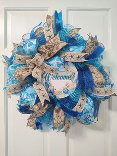 a welcome wreath hanging on the front door for someone's birthday or other special occasion