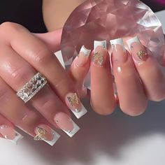 PRICES MAY VARY. 💅【Package Contains】You will get 24 pieces french fake nails with delicate designs,1 piece nail file, 24pieces nail jelly stickers and 1 piece wooden stick for removing cute nails tips. No need to buy other things, you can get the nail salon-like effect. 💅【Material】: These false nails with designs are made of healthy ABS material, no irritating smell, higher gloss, not easy to break, and will not harm the human body or nails, and can be used with confidence. ���💅【Lasting Effect】: Nail Ideas White And Gold, Jelly Stickers, Fake Nails White, French Tip Press On Nails, Girly Acrylic, White French Tip, Manicure Diy, Style Français, French Acrylic Nails