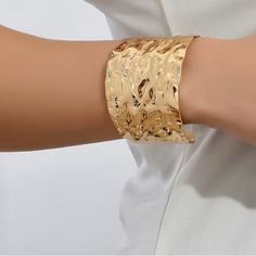 Golden Stylish Chunky Cuff Bracelet Goldish Hammered Pattern More For Smaller Wrists Ships Same Or Next Business Day Smoke And Pet Free Home 5 Star Posher Adjustable Open Cuff Jewelry For Party, Gold Open Cuff Bracelets For Party, Gold Cuff Bracelets For Party, Trendy Gold Cuff Bangle, Gold Open Cuff Bracelet For Party, Trendy Cuff Bangle For Parties, Metal Cuff Bracelets For Party, Open Cuff Bracelet For Party, Party Cuff Bracelets In Metal