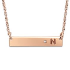 Create a meaningful gift or a cherished keepsake and inscribe your favorite initial onto this sleek women's bar pendant necklace, punctuated with a brilliant diamond accent. Fashioned in 14K rose gold, the 18-inch rope chain secures in place with a spring ring clasp. Free personalization! Please provide one initial for this item if you wish to personalize it. Pendant Necklace Diamond, Jewelry Bar, Bar Pendant Necklace, Jared The Galleria Of Jewelry, Necklace Diamond, Bar Pendant, Diamond Pendant Necklace, Brilliant Diamond, Rope Chain