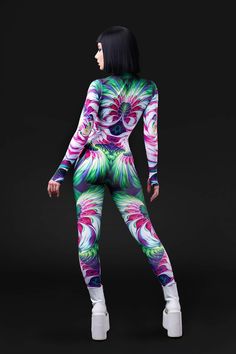 Rave and Festival Outfit Badinka. Form-fitting fest and rave bodysuit with unique designer print and vivid colors that do not fade away with washing. High quality stretchy and sturdy elastic material that makes you feel comfortable and sexy. 

 
 Mock Neckline 
 Robust and Hidden Front Zipper Closure 
 Long Sleeves 
 UV Black Light Reactive 
 82% Polyester 18% Elastane 
 Non-Transparent Italian Lycra 
 30° Cold Wash, Hang dry 
 

 Sexy rave bodysuit, burning man clothing women, festival clothing Multicolor Fitted Rave Unitard, Fitted Rave Unitard For Festivals, Fitted Multicolor Unitard For Party, Fitted Printed Bodysuit For Party, Printed Fitted Bodysuit For Party, Stretch Multicolor Graphic Print Bodysuit, Fitted Multicolor Bodysuit, Fitted Green Bodysuit For Rave, Fitted Multicolor Printed Jumpsuits And Rompers