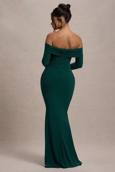 An enchanting style designed for romantic evenings, event season calls for a dress like Amaia. Carefully crafted in a bottle green shade of our sculpting jersey fabric, this maxi is defined by its bardot neckline, subtle cowl detail and long, flattering sleeves. From winter weddings to special prom nights, Amaia is a captivating choice. Features - Premium stretch jersey- Bardot neckline - Draped cowl - Long sleeves- Invisible zip closure- Maxi length Sizing & Fit Model is 5'6 and wears UK size 8 / US size 4 Product Information Designed exclusively by Club L London Double layered with good stretch Premium jersey in Bottle Green (95% Polyester, 5% Elastane) 155cm total length SKU: CL134773047 Baby Shower Dress Winter, Long Sleeve Wedding Guest Dresses, Winter Cocktail Dress, Green Maternity Dresses, Maxi Dresses Uk, Fly Outfit, Bardot Neckline, Emerald Green Dresses, Fall Wedding Guest Dress