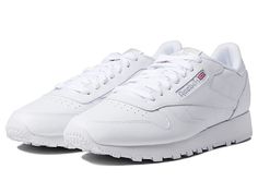 Reebok Lifestyle Classic Leather - Shoes : White/Pure Grey 1 : Celebrate all of the flavors of love in classic low-pro casual sneaker style with the Reebok Lifestyle Classic Leather sneakers. Soft garment leather, suede, and synthetic uppers depending on color. Classic low-top sneaker profile in a timeless design. Lace-up construction. Molded sockliner provides comfort, cushioning, and durability. EVA midsole and abrasive rubber outsole for lightweight cushioning, traction, and durability. Class Rebox Shoes, Rebook Shoes, White Reebok Shoes, White Sneakers Reebok, All White Reebok Sneakers, Reebok White Sneakers, 1980s Shoes, Men’s Reebok Sneakers, Reebok Classic White