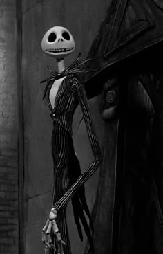 a black and white photo of a skeleton dressed as jack skellingy from the nightmare