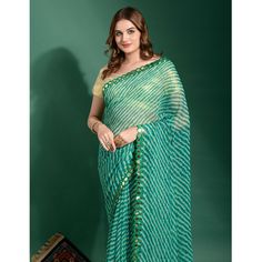 Green colored saree is made from georgette fabric which is highlighted with beautiful striped print and mirror work as shown. comes along unstitched zari brocade blouse piece which you can customise as per your design/style. Occasion - You can wear this saree for festivals and functions. Note:- The actual product may differ slightly in color and design from the one illustrated in the images when compared with computer or mobile screen. Measurements: Saree : Chiffon : 5.5 Mtrs Blouse : Chiffon : 0.8 Mtr Material: Chiffon Stitch Type: Unstitched Country of Origin: India Care Guide: Dry Clean Festive Green Chiffon Saree, Green Georgette Saree With Bandhani Print, Green Chiffon Saree With Dupatta, Traditional Green Chiffon Saree, Green Georgette Dupatta With Printed Border, Green Chiffon Saree With Unstitched Blouse, Green Bandhani Print Traditional Wear, Saree Chiffon, Engagement Saree