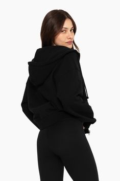 Experience comfort and style with our Zip Hoodie in Onyx. Slightly less oversized than our Oversized Zip Hoodie, it boasts a full-length zipper, patch pockets, hood with drawcord, and ribbed waistband and cuffs. Made from our heavyweight sweats fabric, it ensures coziness. Embroidered with the SET logo on the upper left chest, it adds a fashionable touch to your wardrobe. Oversized Solid Hoodie With Zipper, Oversized Solid Hoodie With Zipper Closure, Oversized Fleece Half-zip Hoodie, Oversized Fleece Hoodie With Half-zip, Oversized Hooded Jacket With Ribbed Cuffs For Loungewear, Oversized Hooded Jacket For Loungewear Athleisure, Oversized Hooded Jacket With Double-lined Hood For Loungewear, Sporty Oversized Hooded Jacket With Ribbed Cuffs, Relaxed Fit Zipper Hoodie For Loungewear