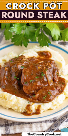 the crock pot roast is on top of mashed potatoes