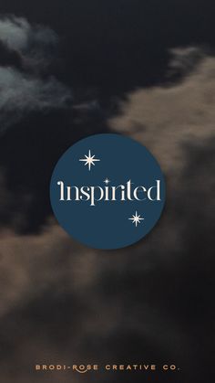 an image of the word inspired in white and blue on a dark background with clouds