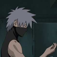 an anime character with grey hair holding his hand out