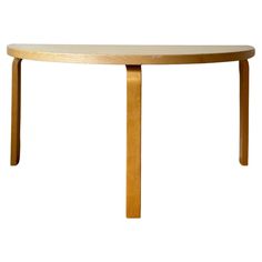 a wooden table with two legs on it