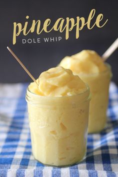 pineapple dole whip in a mason jar on a blue and white checkered tablecloth