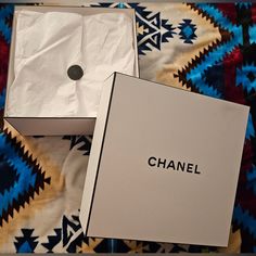 the box is open and ready to be used as an ornament for chanel