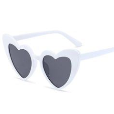 The Chanel Heart Frame Sunglasses are a playful yet sophisticated accessory that adds a touch of glamour to any outfit. Ideal for fashion-forward individuals who love to make a statement, these women's heart-shaped sunglasses combine iconic design with modern flair. Iconic Heart-Shaped Frames The women's heart-shaped sunglasses feature eye-catching heart-shaped frames that are both whimsical and chic. These frames add a fun, romantic touch to your look, making them perfect for anyone who loves t Heart-shaped Sunglasses With Heart Print For Party, Heart-shaped Party Sunglasses With Heart Print, Trendy Heart Shaped Tinted Sunglasses, Trendy Heart-shaped Tinted Sunglasses, Elegant Heart-shaped Sunglasses With Tinted Lenses, Elegant Heart-shaped Tinted Sunglasses, Trendy Heart-shaped Sunglasses With Mirrored Lenses, Trendy Heart Print Sunglasses For Valentine's Day, Trendy Heart-shaped Sunglasses For Valentine's Day