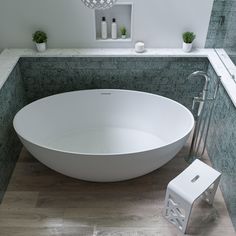 Spa inspired bathtubs such as the ALFI brand free standing resin soaking tubs, have become a popular choice for individuals looking to add a sculptural element to their bathroom décor. These tubs do not include features such as jets or bubbles, letting you enjoy a deep quiet soak, just like old times. While relatively new to the market, solid surface resin tubs retain heat well, and come in a variety of shapes and sizes, making them a great choice for easily adding a touch of sophisticated elega Soaking Tubs, Modern Bathtub, Gorgeous Places, Bathtub Doors, Spa Inspiration, Soaking Bathtubs, Handheld Shower Head, Bathtub Accessories, Tub Filler