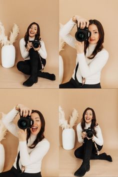 a woman is taking pictures with her camera and posing for the camera, while sitting on the floor